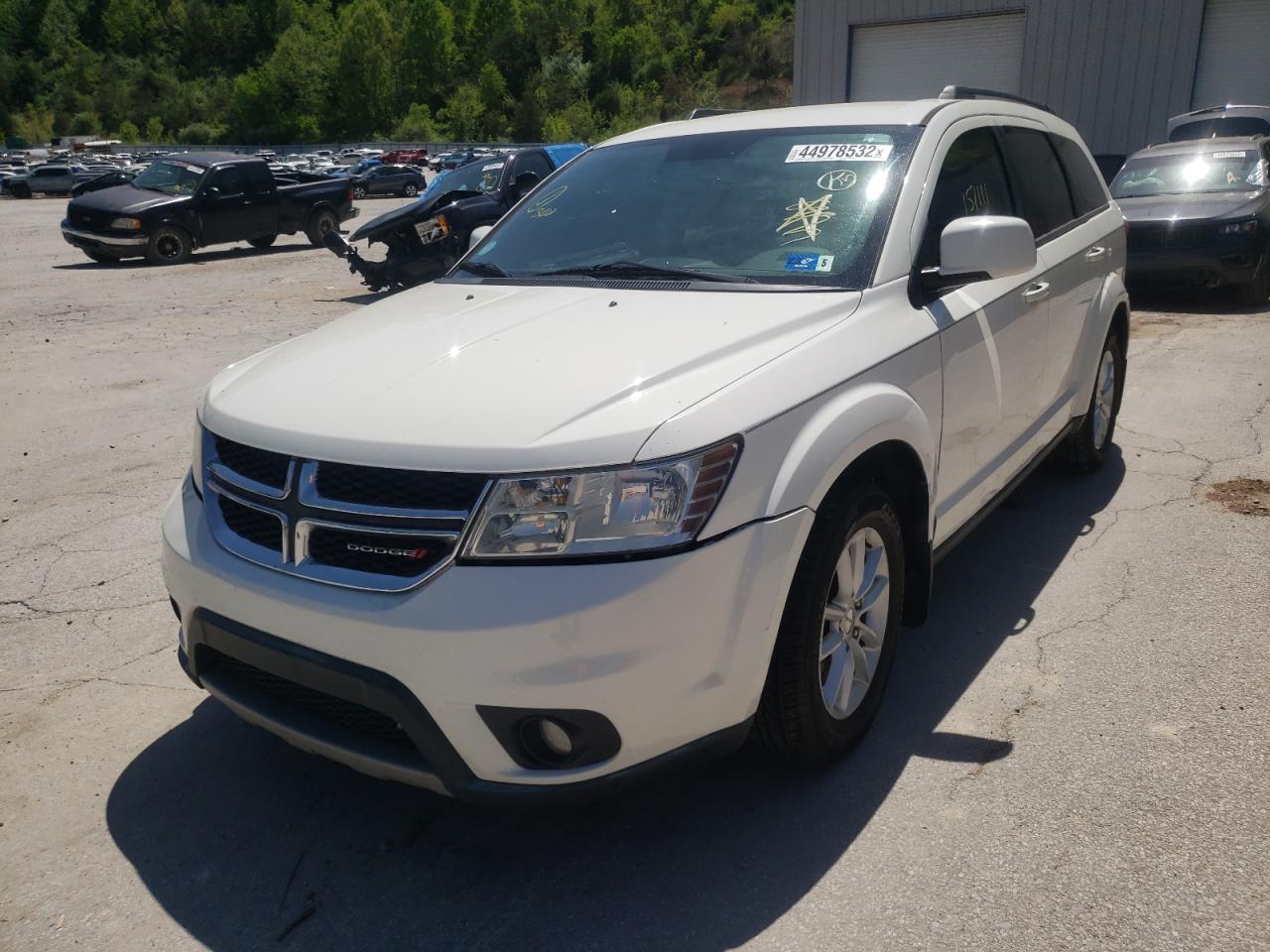 Photo 2 from auction – 2013 DODGE JOURNEY SX with VIN 3C4PDCBG2DT600395