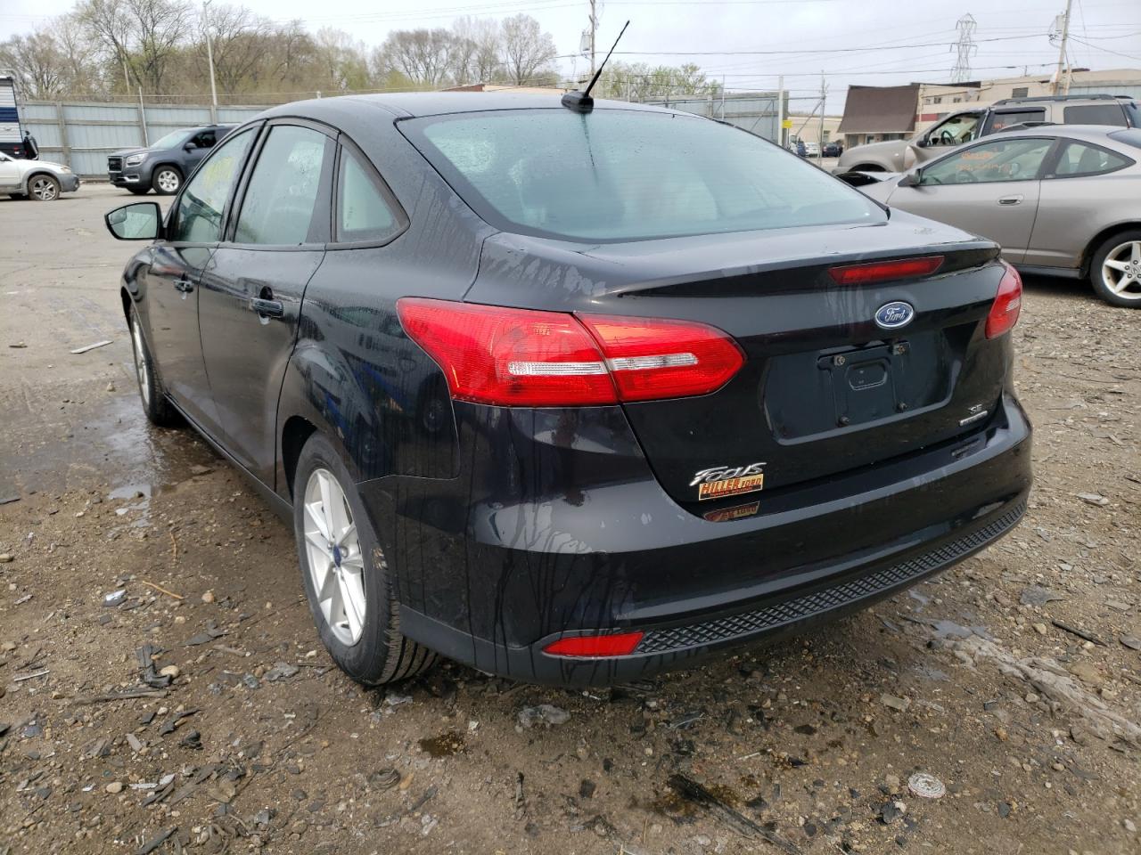 Photo 3 from auction – 2015 FORD FOCUS SE with VIN 1FADP3F21FL247502