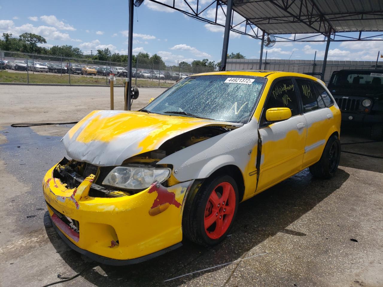 Photo 2 from auction – 2003 MAZDA PROTEGE PR with VIN JM1BJ245931193108