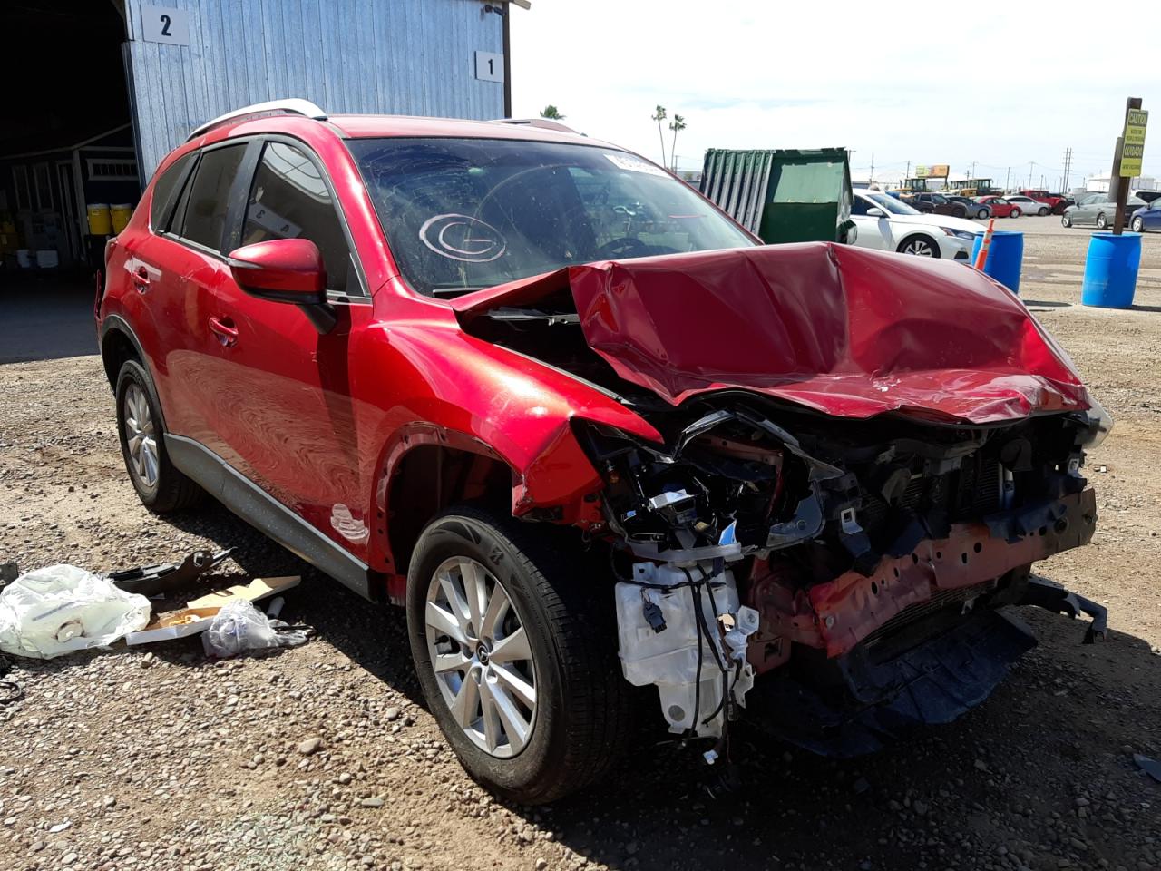 MAZDA CX-5 TOURI 2016 with VIN JM3KE2CY8G0663194 - Photo from auction