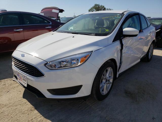 Photo 2 from auction – 2018 FORD FOCUS SE with VIN 1FADP3F21JL263952