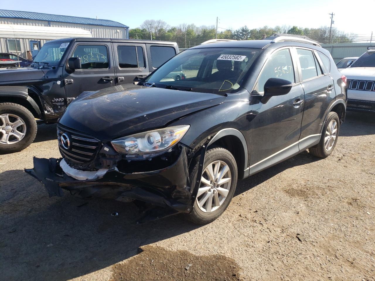 Photo 2 from auction – 2016 MAZDA CX-5 SPORT with VIN JM3KE4BY7G0692103