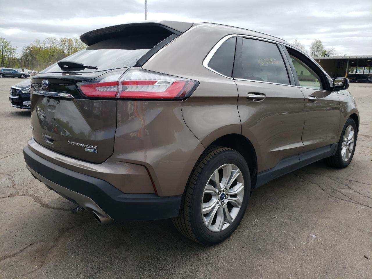 Photo 4 from auction – 2019 FORD EDGE TITAN with VIN 2FMPK4K99KBC63936