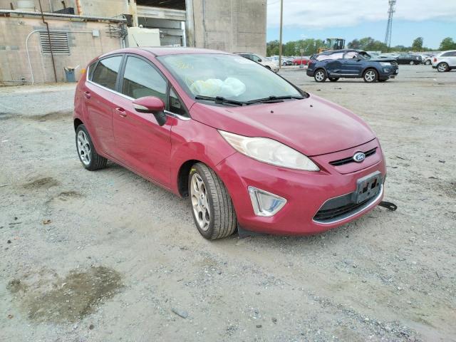 FORD FIESTA SES 2011 with VIN 3FADP4FJ9BM144642 - Photo from auction