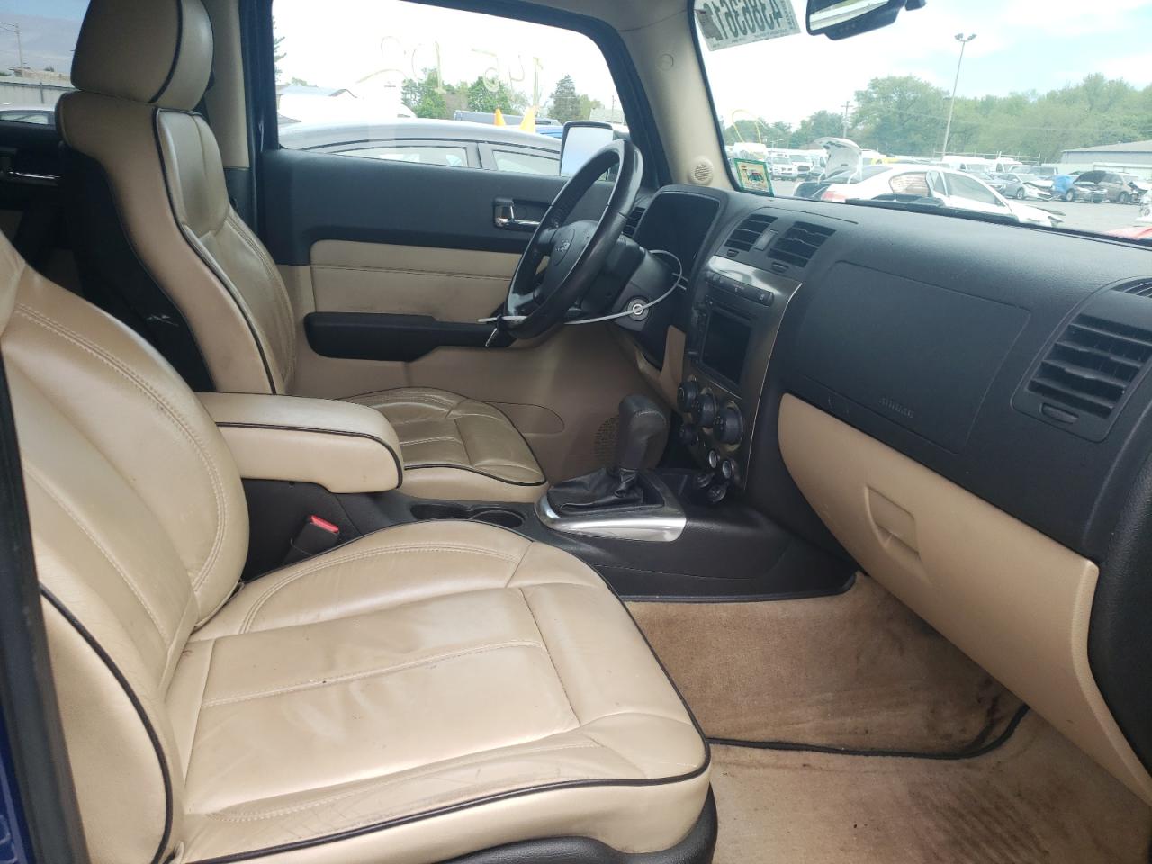 Photo 5 from auction – 2009 HUMMER H3 with VIN 5GTEN13E698109946