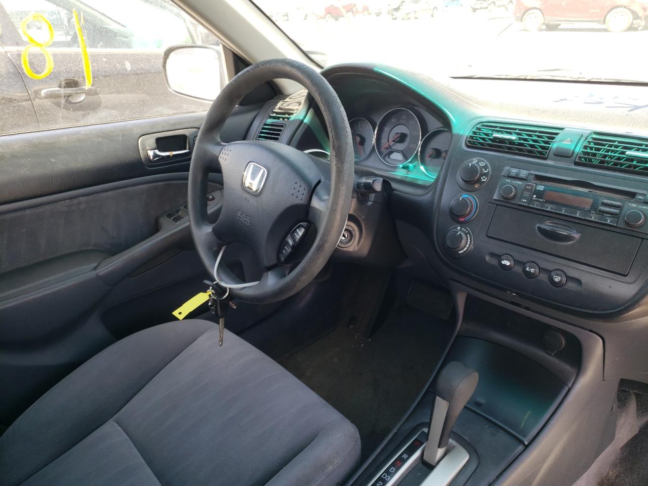 Photo 9 from auction – 2003 HONDA CIVIC LX with VIN 1HGES16573L025894