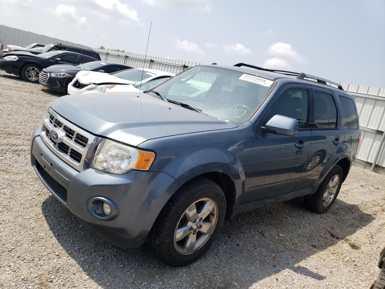 Photo 2 from auction – 2011 FORD ESCAPE LIM with VIN 1FMCU9EG7BKB17878