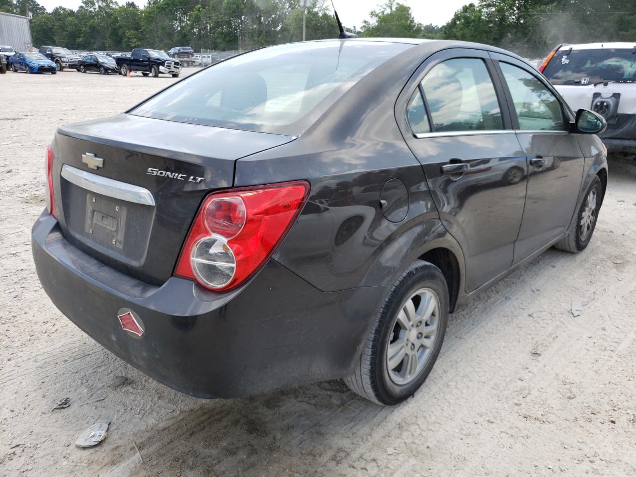Photo 4 from auction – 2014 CHEVROLET SONIC LT with VIN 1G1JC5SH5E4157737