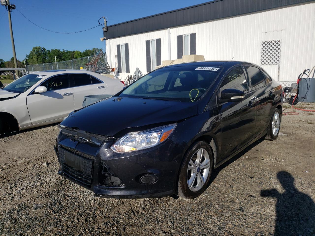 Photo 2 from auction – 2014 FORD FOCUS SE with VIN 1FADP3F2XEL141161