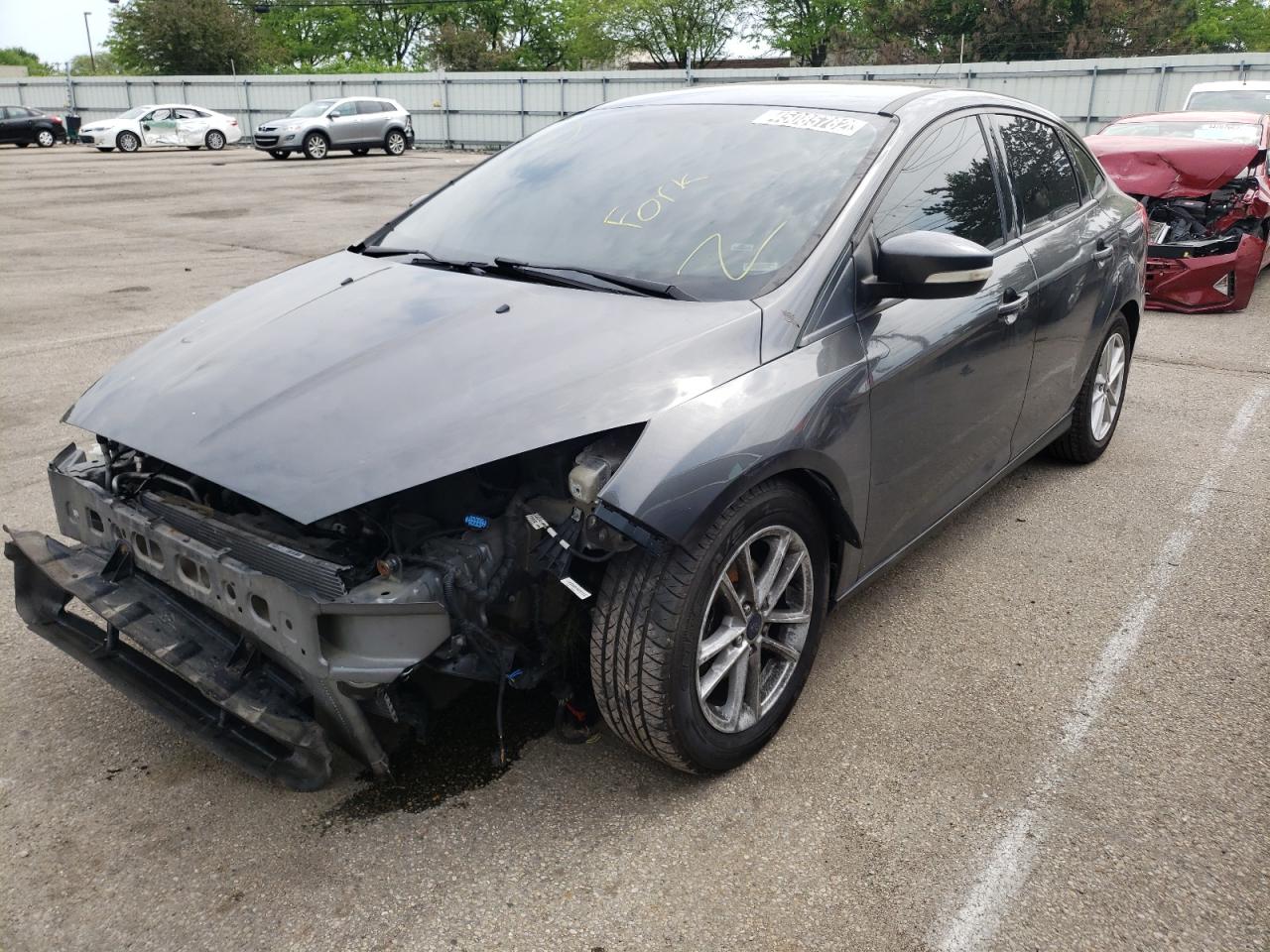 Photo 2 from auction – 2016 FORD FOCUS SE with VIN 1FADP3F27GL290016