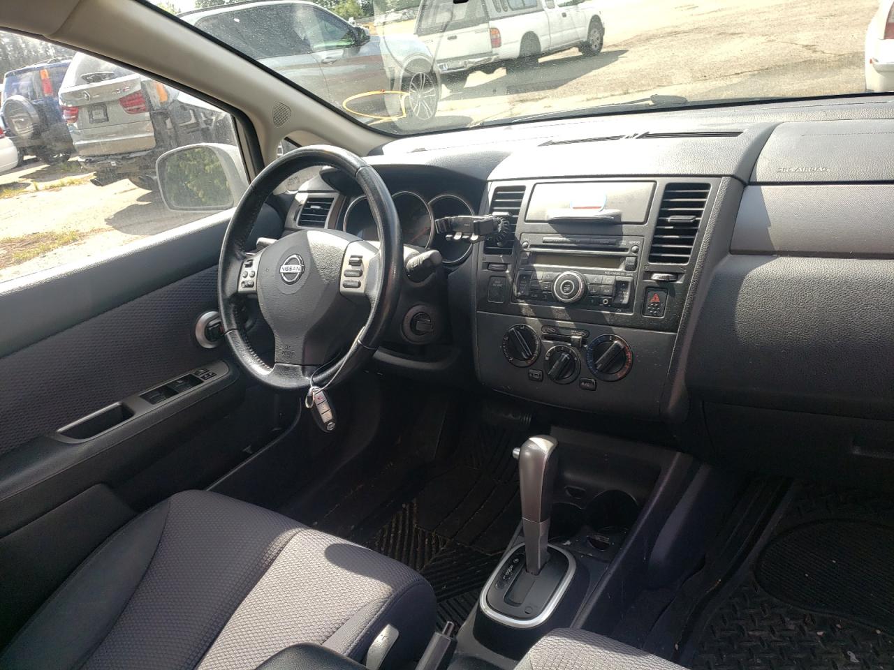 Photo 9 from auction – 2009 NISSAN VERSA S with VIN 3N1BC13E39L363635