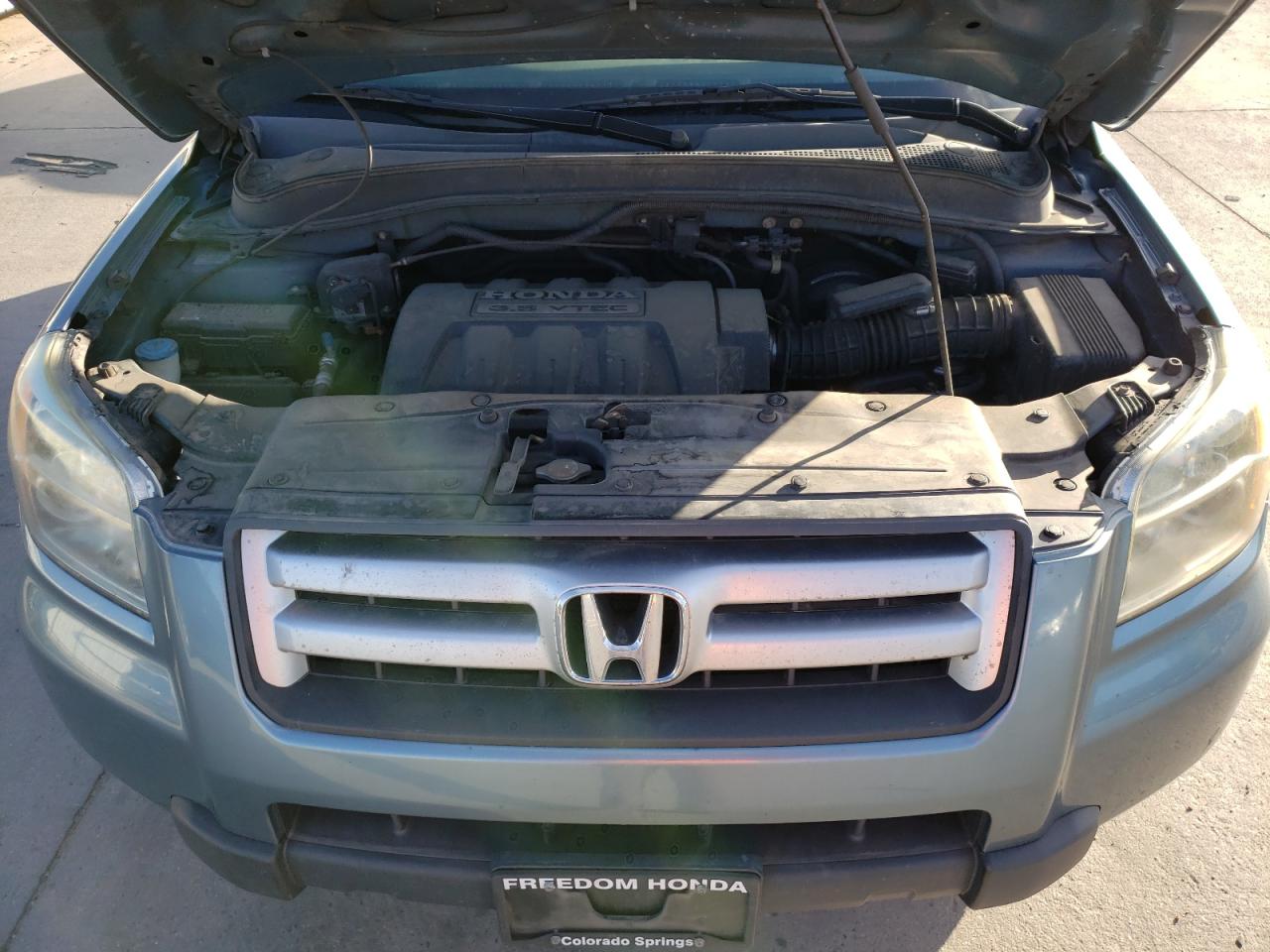 Photo 7 from auction – 2006 HONDA PILOT EX with VIN 5FNYF18556B030399