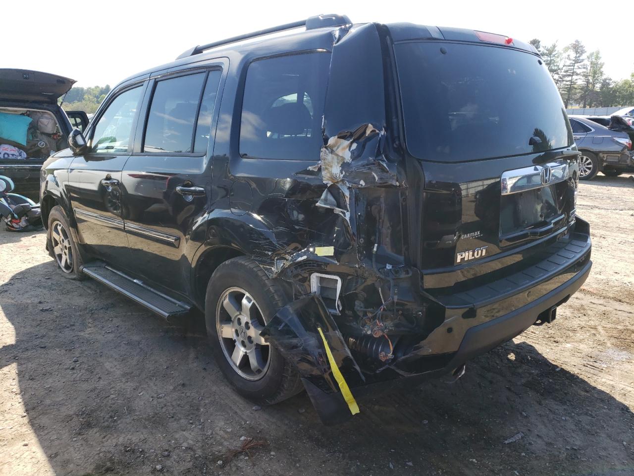 Photo 16 from auction – 2011 HONDA PILOT TOUR with VIN 5FNYF4H97BB080476