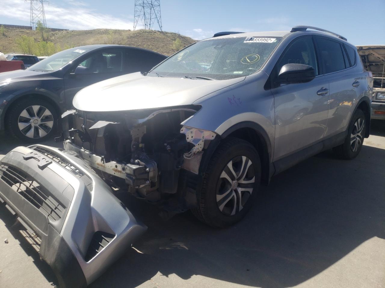 Photo 2 from auction – 2017 TOYOTA RAV4 LE with VIN 2T3BFREV7HW564140