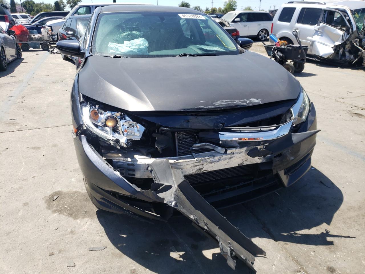 Photo 9 from auction – 2016 HONDA CIVIC LX with VIN 19XFC2F59GE011337