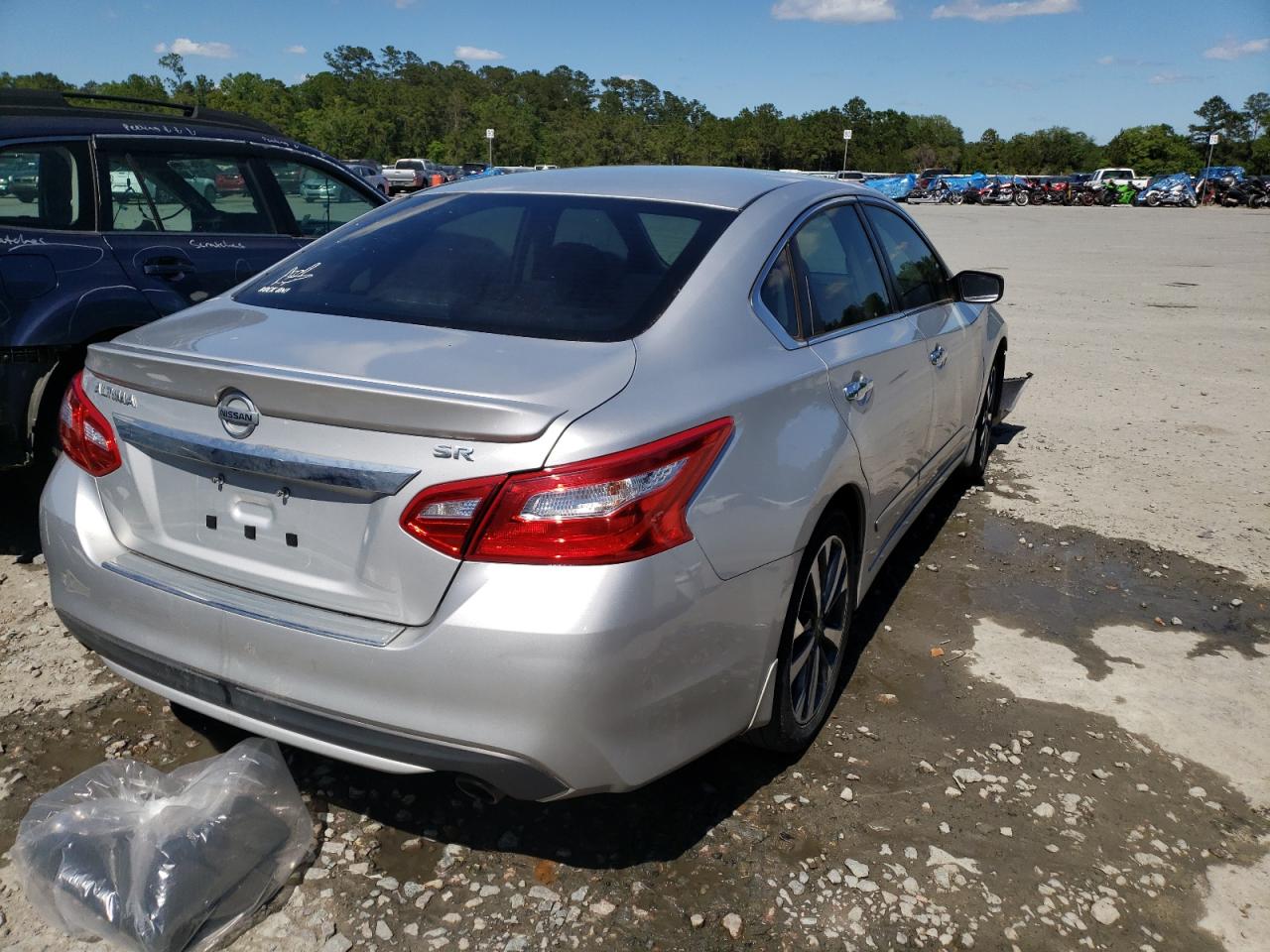 Photo 4 from auction – 2016 NISSAN ALTIMA 2.5 with VIN 1N4AL3AP7GC213387