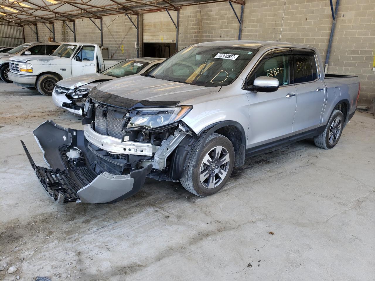 Photo 2 from auction – 2019 HONDA RIDGELINE with VIN 5FPYK3F78KB004554