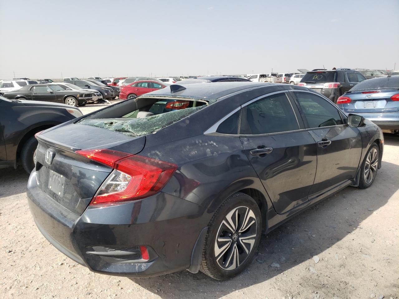Photo 4 from auction – 2018 HONDA CIVIC EX with VIN JHMFC1F36JX039675