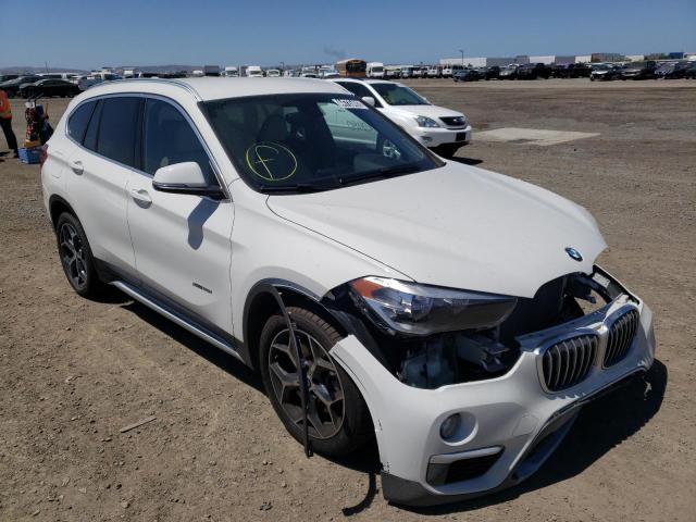 BMW X1 XDRIVE2 2018 with VIN WBXHT3C36J5F90619 - Photo from auction