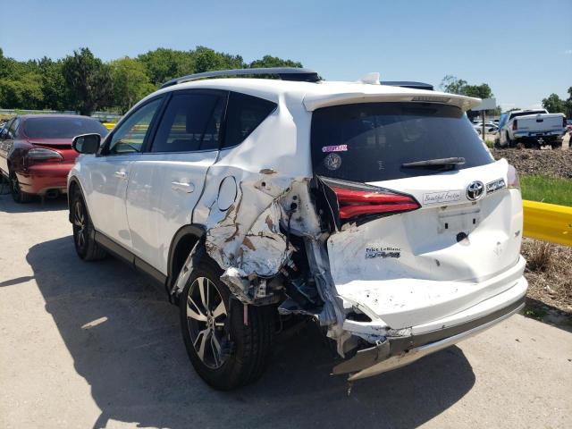 Photo 3 from auction – 2017 TOYOTA RAV4 XLE with VIN JTMWFREV5HJ704833