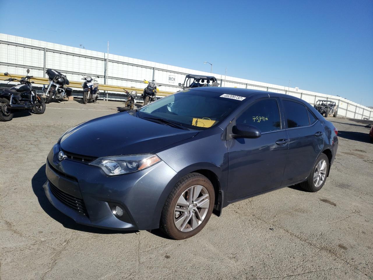 Photo 2 from auction – 2015 TOYOTA COROLLA EC with VIN 5YFBPRHE1FP246921