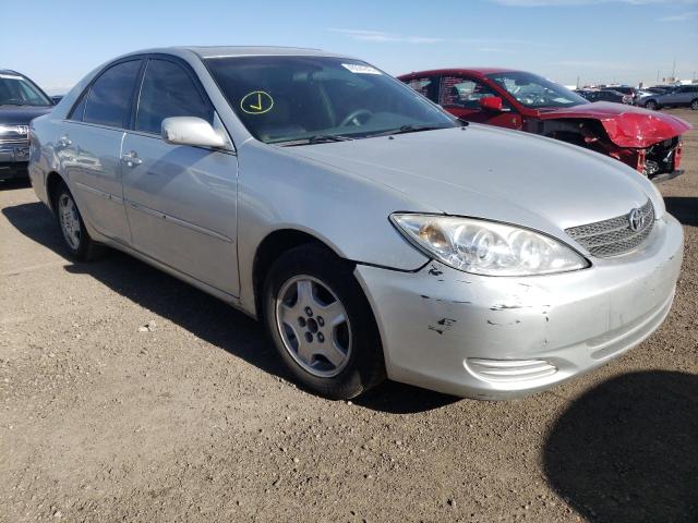 TOYOTA CAMRY LE 2002 with VIN 4T1BF30K22U526776 - Photo from auction