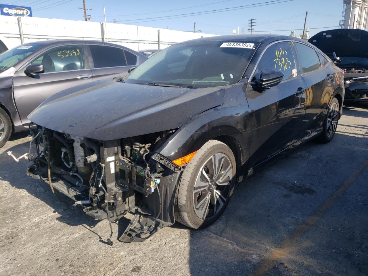 Photo 2 from auction – 2016 HONDA CIVIC EX with VIN 2HGFC1F37GH643638