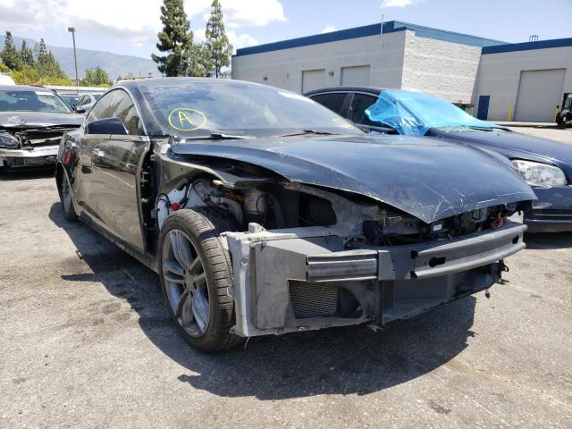 TESLA MODEL S 2013 with VIN 5YJSA1CN0DFP12857 - Photo from auction