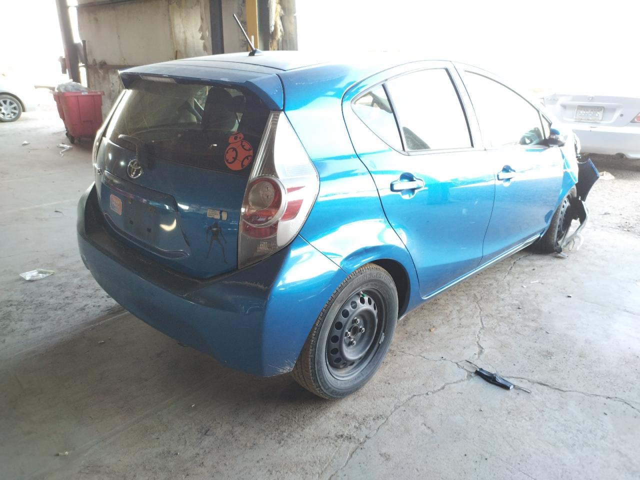 Photo 4 from auction – 2014 TOYOTA PRIUS C with VIN JTDKDTB31E1066709