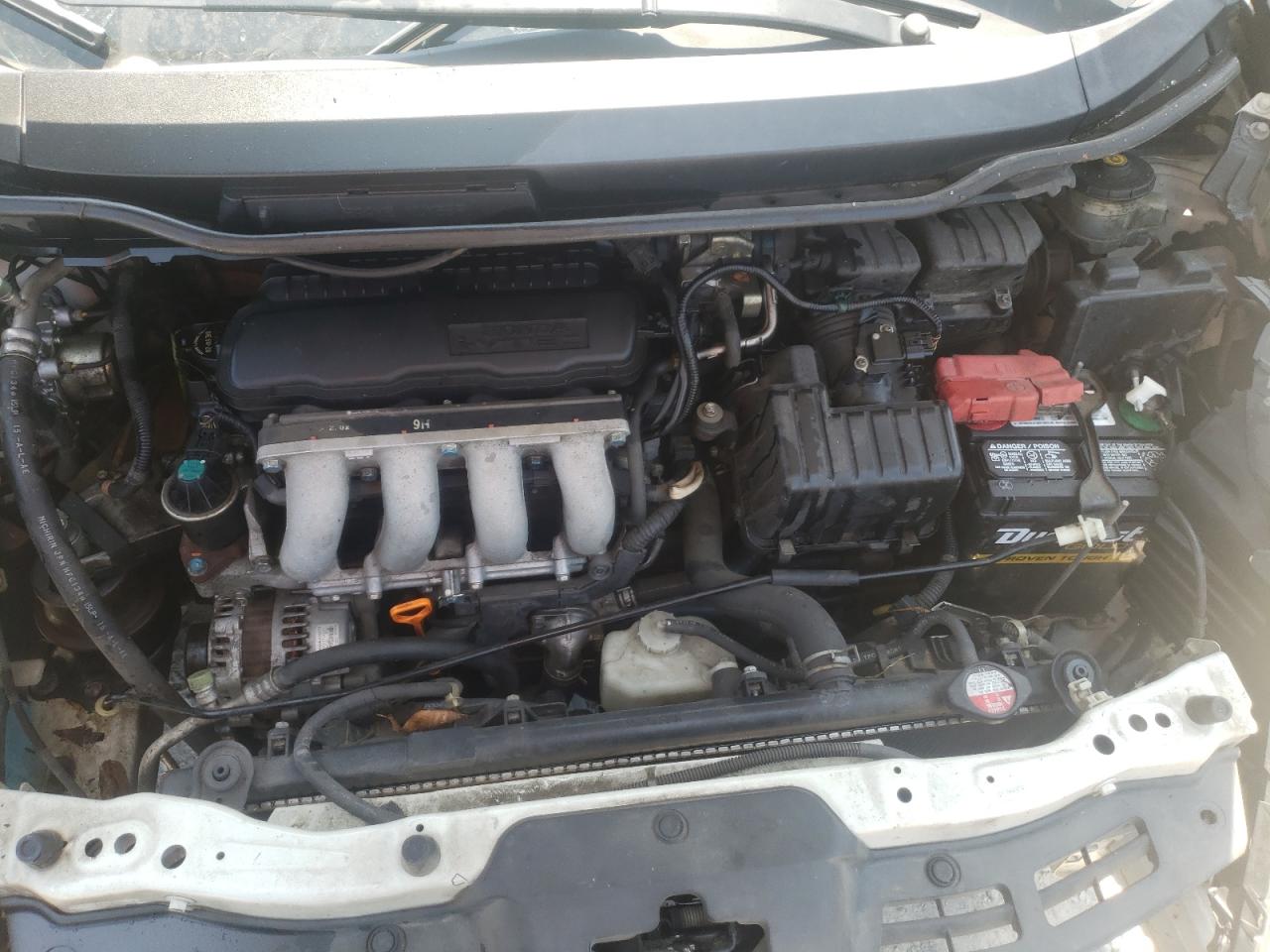 Photo 12 from auction – 2009 HONDA FIT with VIN JHMGE88259S057086