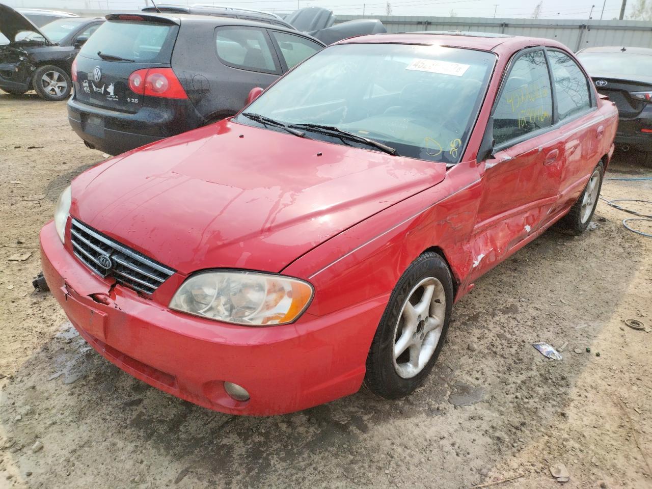Photo 2 from auction – 2002 KIA SPECTRA BA with VIN KNAFB121825123709