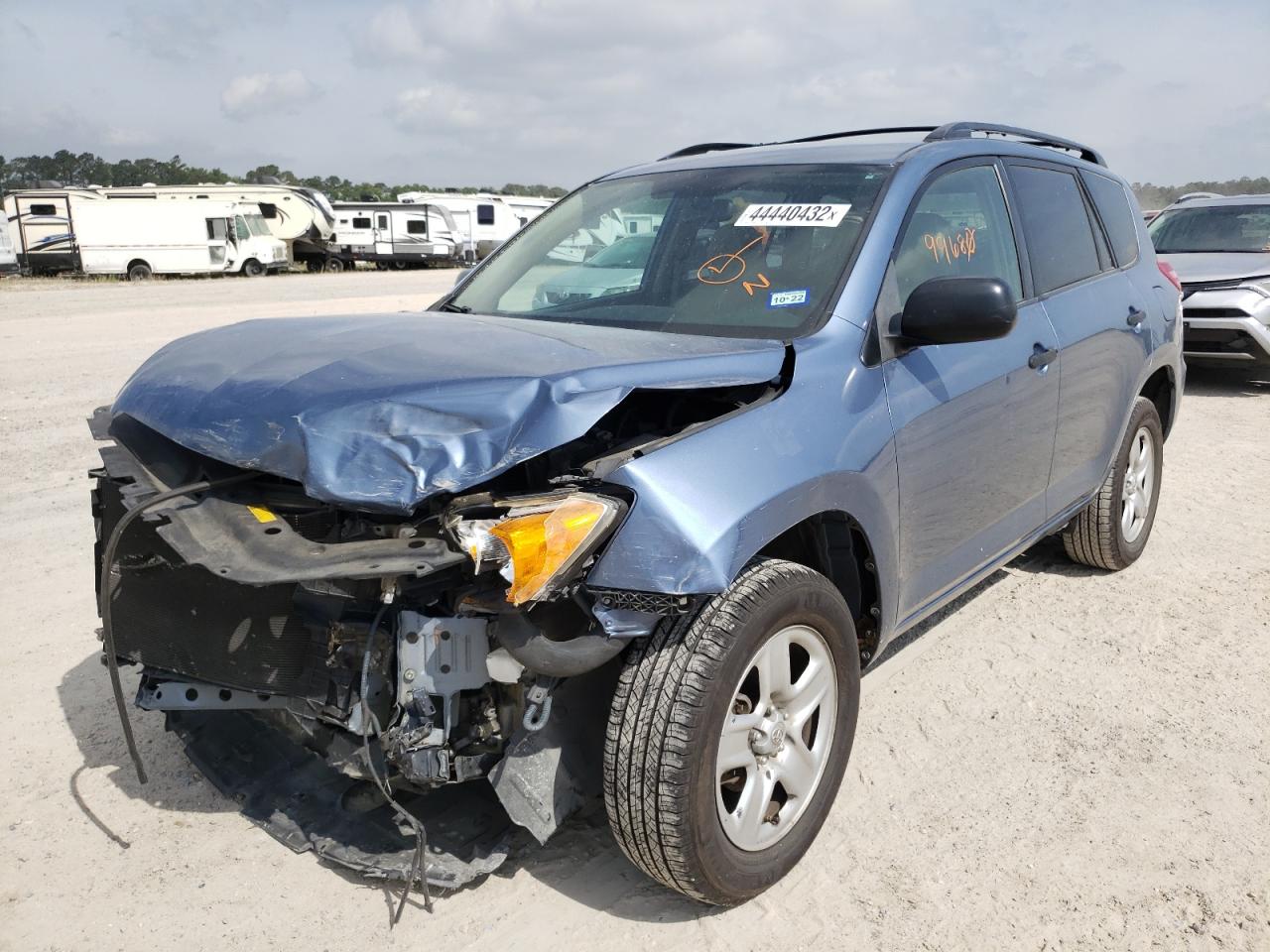 Photo 2 from auction – 2010 TOYOTA RAV4 with VIN JTMBF4DV5AD034059