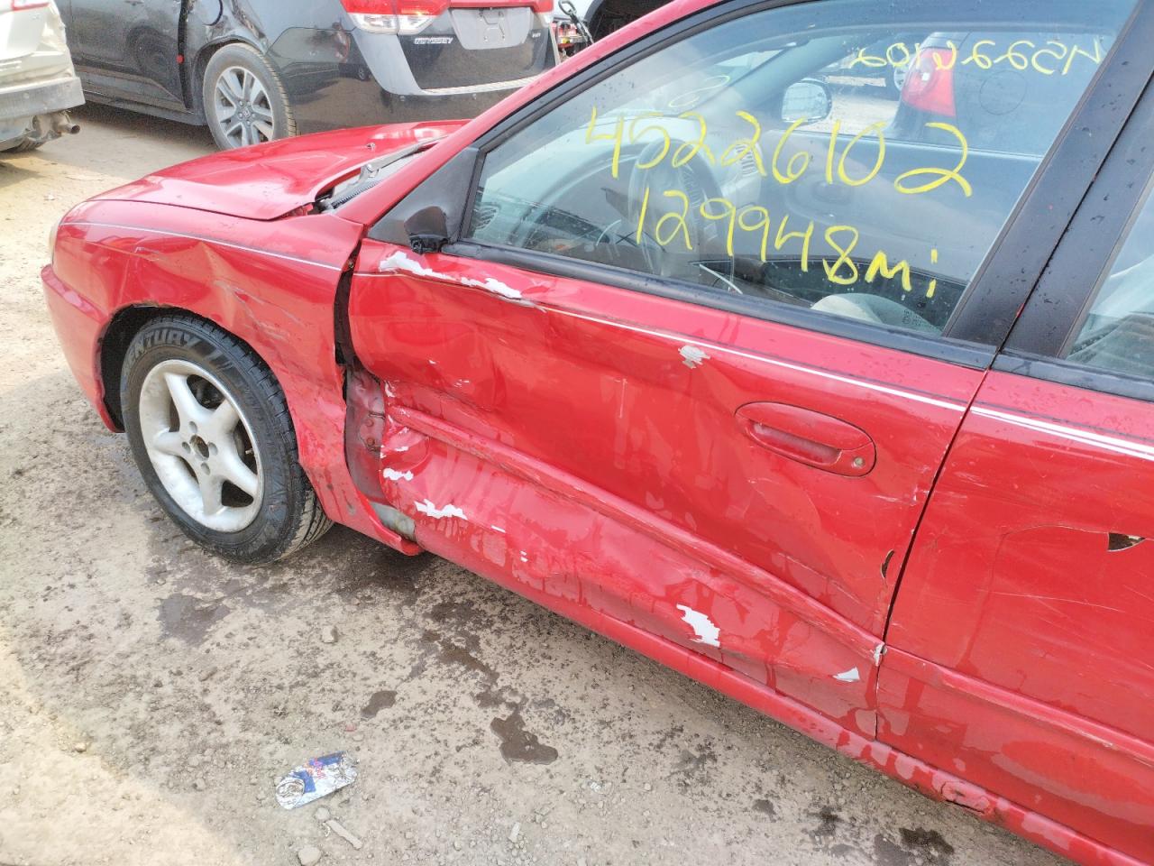 Photo 9 from auction – 2002 KIA SPECTRA BA with VIN KNAFB121825123709