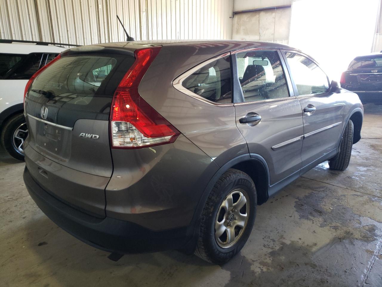 Photo 4 from auction – 2012 HONDA CR-V LX with VIN 5J6RM4H39CL071292