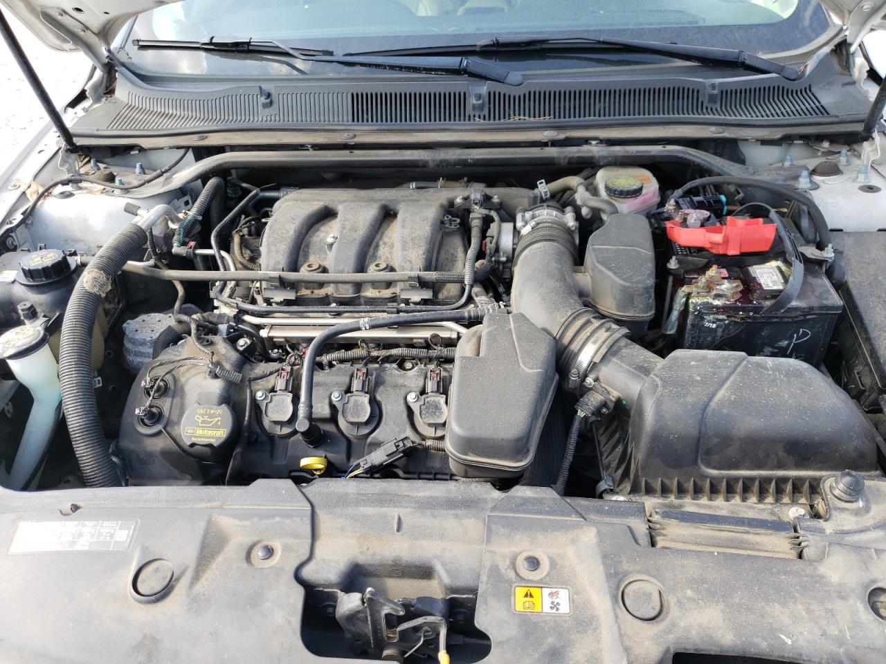 Photo 7 from auction – 2014 FORD TAURUS SEL with VIN 1FAHP2E82EG126714