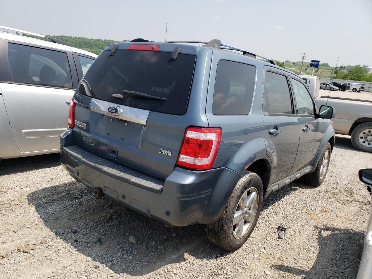 Photo 4 from auction – 2011 FORD ESCAPE LIM with VIN 1FMCU9EG7BKB17878