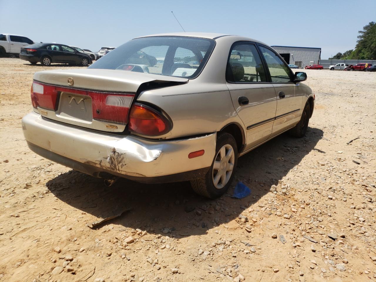 Photo 4 from auction – 1998 MAZDA PROTEGE DX with VIN JM1BC1417W0215862