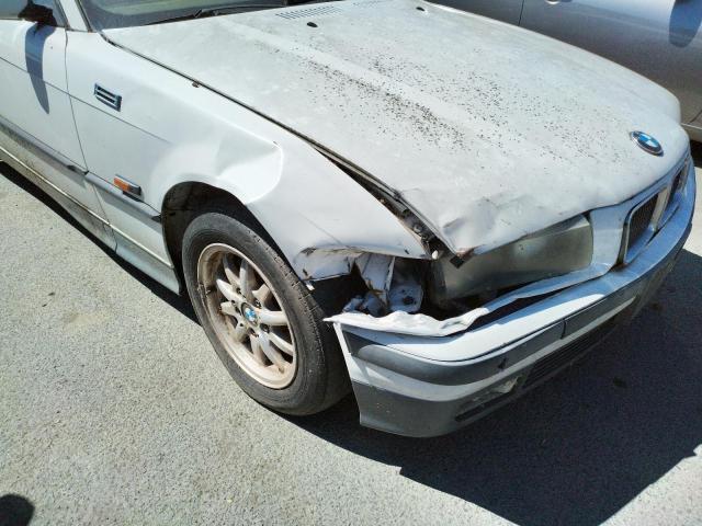 Photo 9 from auction – 1995 BMW 318 IC AUT with VIN WBABK6326SED17788