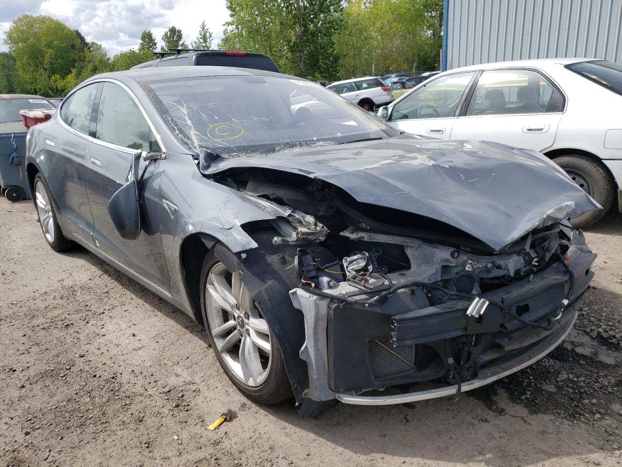 TESLA MODEL S 2012 with VIN 5YJSA1CN0CFP01596 - Photo from auction