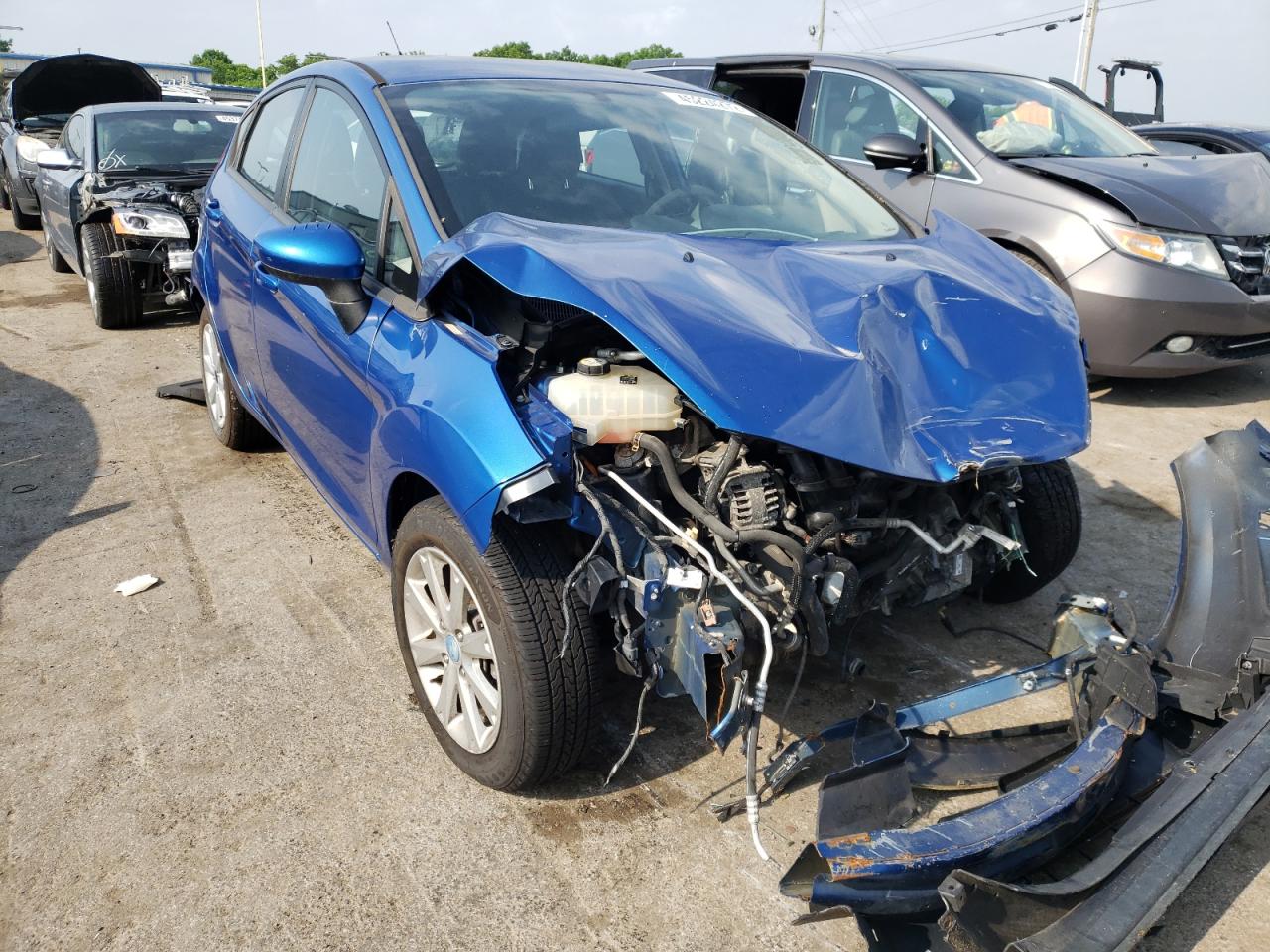 FORD FIESTA SE 2011 with VIN 3FADP4EJ1BM115637 - Photo from auction