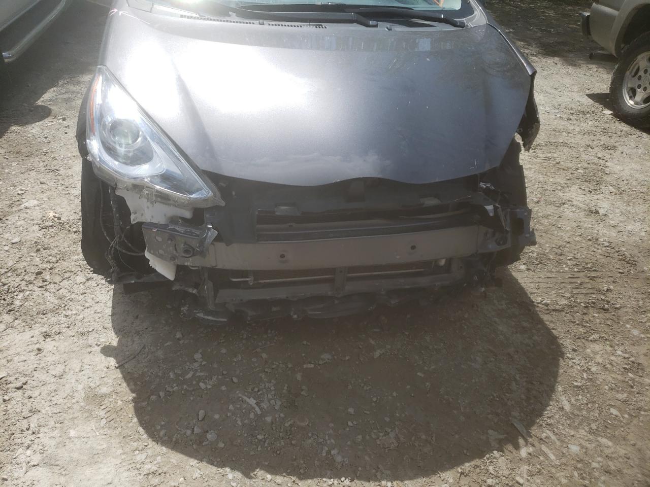Photo 9 from auction – 2015 TOYOTA PRIUS C with VIN JTDKDTB37F1101724