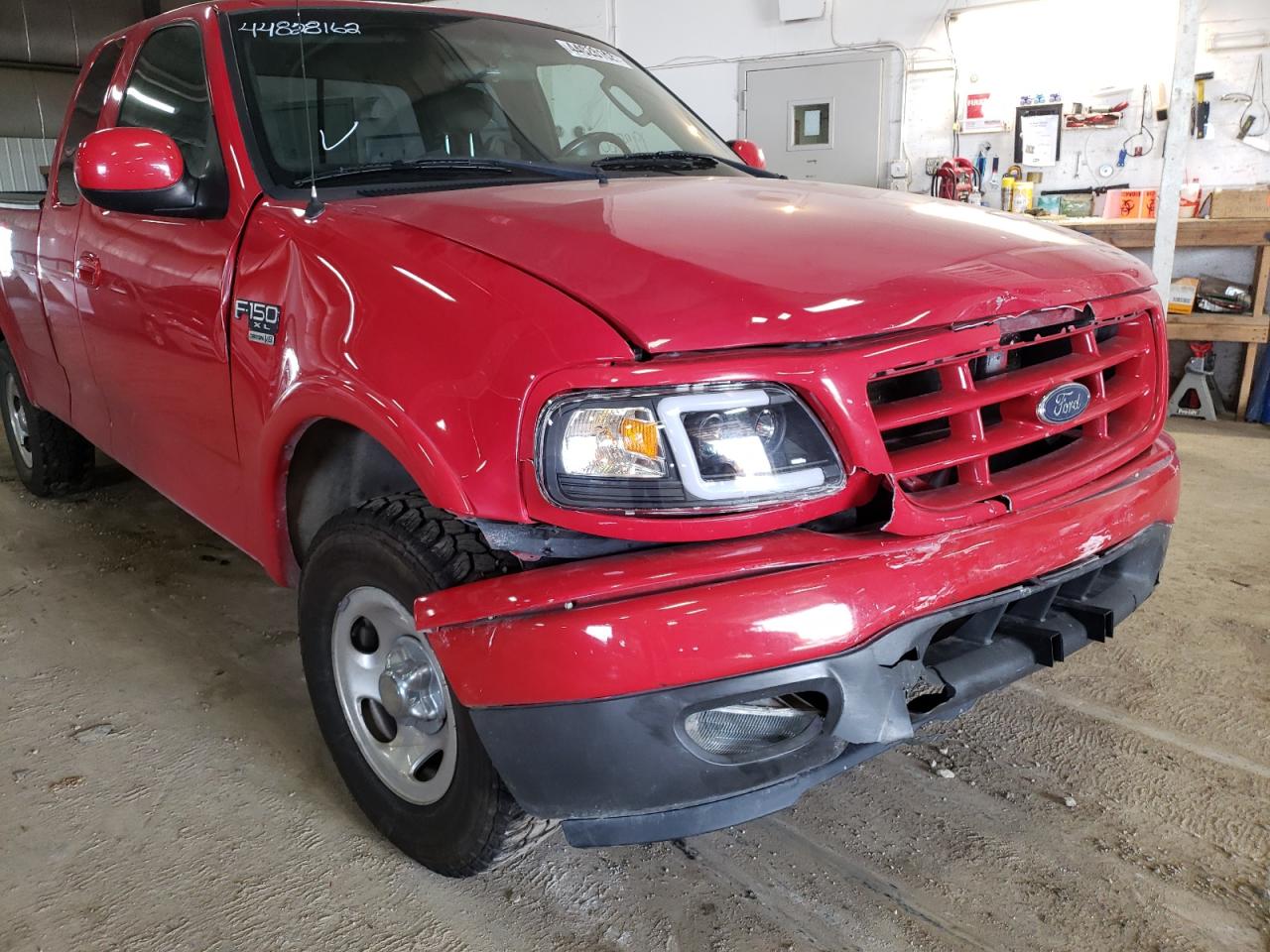 Photo 9 from auction – 2003 FORD F150 with VIN 2FTRX18W63CA57933