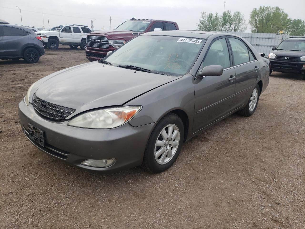 Photo 2 from auction – 2003 TOYOTA CAMRY LE with VIN 4T1BE32K83U707480