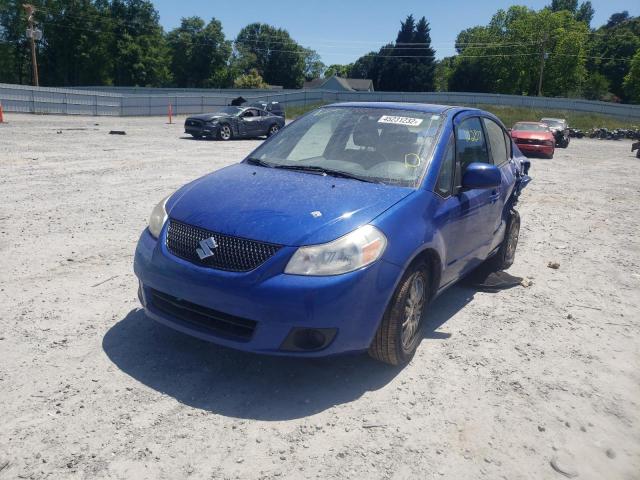 Photo 2 from auction – 2012 SUZUKI SX4 LE with VIN JS2YC5A37C6305390