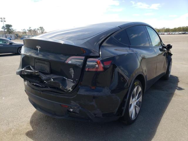 Photo 4 from auction – 2021 TESLA MODEL Y with VIN 5YJYGDEE3MF196873