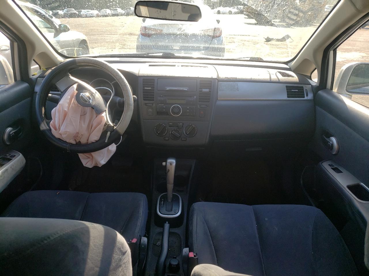 Photo 9 from auction – 2009 NISSAN VERSA S with VIN 3N1BC11E29L394572