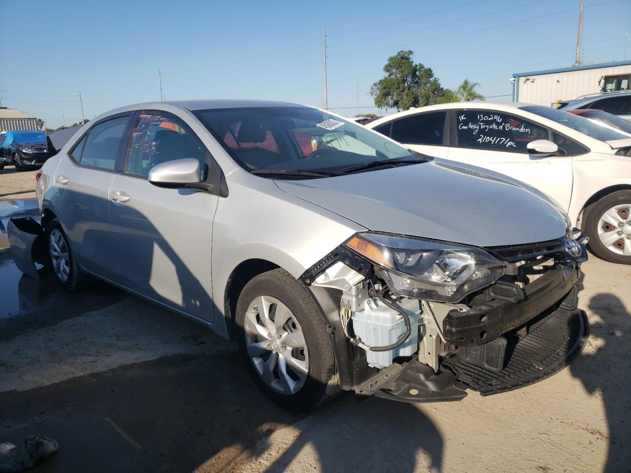 TOYOTA COROLLA L 2016 with VIN 5YFBURHE2GP393727 - Photo from auction