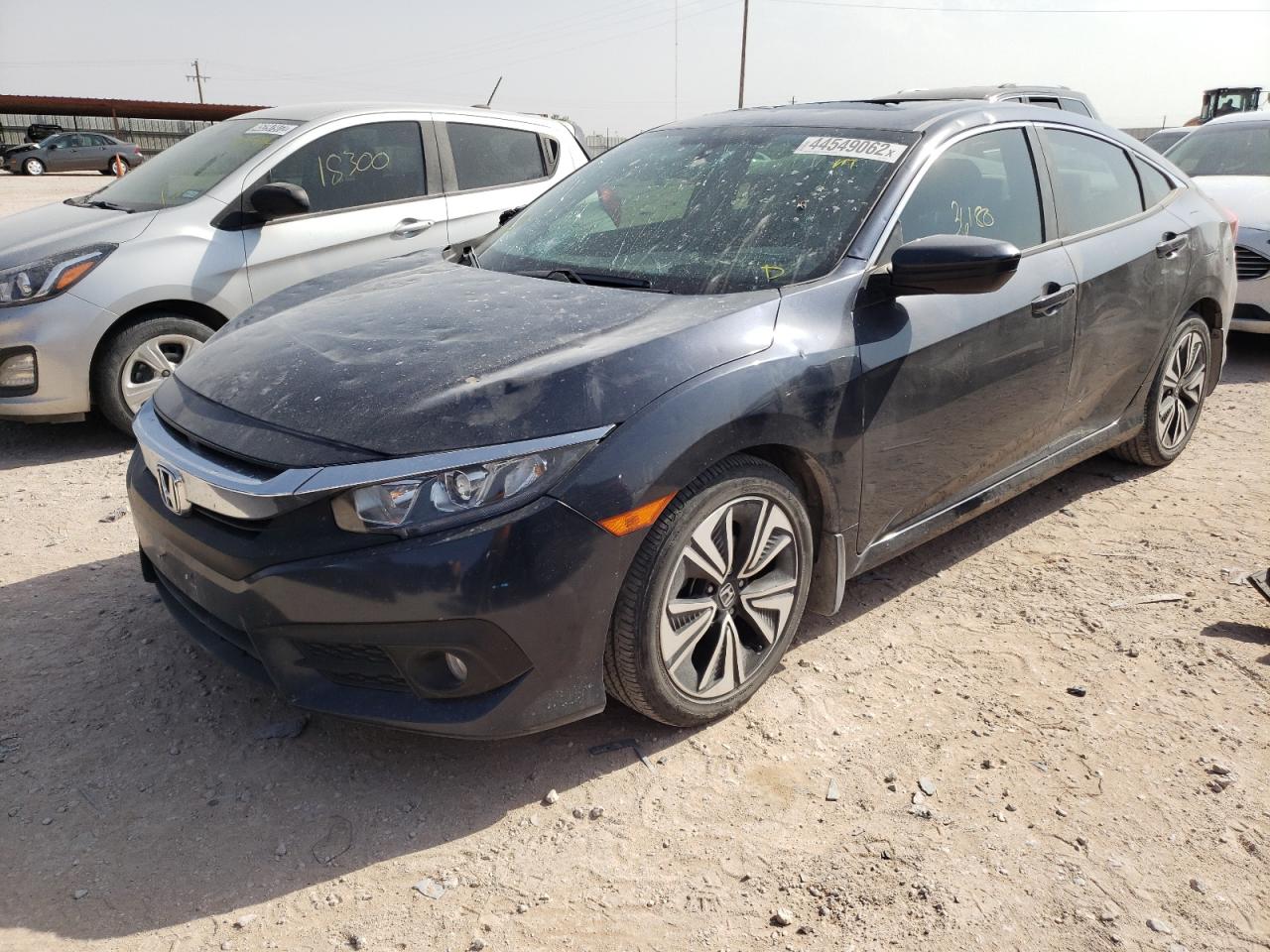 Photo 2 from auction – 2018 HONDA CIVIC EX with VIN JHMFC1F36JX039675