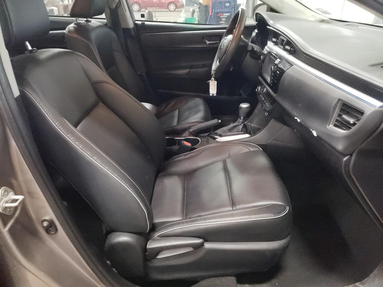 Photo 5 from auction – 2014 TOYOTA COROLLA LE with VIN 5YFBPRHE0EP030878