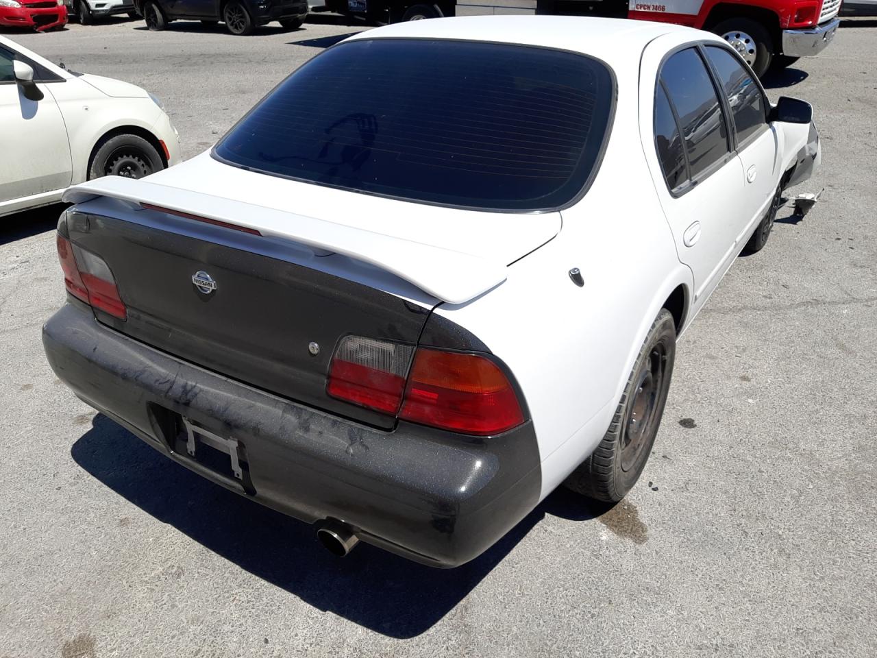 Photo 4 from auction – 1996 NISSAN MAXIMA GLE with VIN JN1CA21D8TT168448